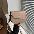 Chic beige and brown leather saddle bag with silver hardware and fashion lettering - Khaki