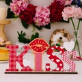 Romantic pink wooden KISS table decor with heart and lip motifs for Valentine's Day - KISS Letter Lip Print Style