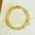 Goldquarz-Armband 7mm mit grünem Jade-Hulu-Anhänger und goldenen Details für Damen - Rutilquarz-Armband mit Nephrit-Jade-Hulu-Anhänger
