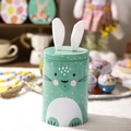 Mint green Easter bunny tin box with white fabric ears for candy and gift storage - Green