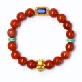 Natural red agate bracelet featuring a golden zodiac pig charm and gemstone accents - Zodiac Horse