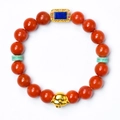 Red agate bracelet with golden dog zodiac charm and blue gemstone inlay details - Zodiac Dog
