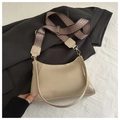 Detail of a beige PU leather shoulder bag with wide geometric woven strap and metal buckle - Dark Khaki