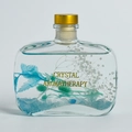 Flacon d'aromathérapie en verre avec cristaux bleus, fleurs séchées et bouchon doré - Bouteille Plate - Gardénia (Aigue-marine)