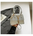Silver grey tote bag with gold V hardware and tassel detail in chic textured faux leather - Silver