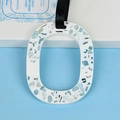 Oval terrazzo aroma stone with colorful fragments and black silk ribbon hanger - Blue Bell (Aquamarine)