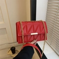 Quilted red leather chain crossbody bag with golden hardware and flap closure - Red