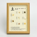 Natural earth element wooden frame with yellow crystals and herbal medicine specimens - Earth Element Frame