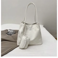 Minimalist white tote bag with gray logo and matching coin purse on soft bedding - White