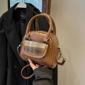 Brown plaid bowling bag for women with retro textured flap and crossbody strap - Brown