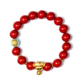 Red cinnabar bead bracelet with golden zodiac monkey charm and blue accent bead - Monkey