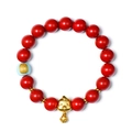 Red cinnabar bead bracelet featuring a gold zodiac rooster charm and a blue decorative bead - Rooster