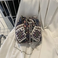 Ethnic style woven canvas bucket bag with colorful geometric patterns and chain strap - Black