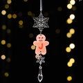 Transparent acrylic Christmas gingerbread man ornament with red letter J on black background - Gingerbread Man Icy Pendant Style J
