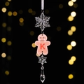Acrylic Christmas ornament featuring an orange gingerbread man with a red letter K and crystal - Gingerbread Man Icy Pendant Style K