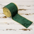 Detail of dark green velvet ribbon with gold metallic edges for Christmas gift wrapping - Green