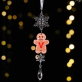 Clear acrylic gingerbread man ornament with red letter V and snowflake detail - Gingerbread Man Icy Pendant Style V