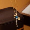 Exquisite gold star and fishtail necklace with sparkling blue gems and micro-inlaid stones - Gold