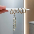 Élégant ensemble de boucles d'oreilles dorées avec pampille étoile et pierre verte - Ensemble Étoile Pompon Or