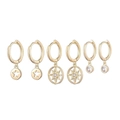 Detail of luxury gold hoop earring set with pearl drops and sparkling star pendants - Hollow Star & North Star Zirconia