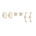 Détails de trois paires de boucles d'oreilles dorées avec étoiles et cristaux - Ensemble Étoile Polaire Or