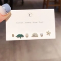 Detail of 6-piece earring set featuring dinosaur and floral designs with silver posts - Hedgehog Pearl Stud Earrings 6-Piece Set