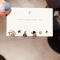 Detail of 6-piece space-themed earring set with star moon and rocket designs - Astronaut Stud Earrings 6-Piece Set