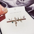 Detail view of 6-piece silver post earring set with moon, star, and zircon studs - Micro-Inlaid Zircon Moon Pearl Hoop Set