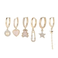 Detail of six-piece gold earring set with zircon star moon heart and bear pendants - Safety Pin Bear Earring Set
