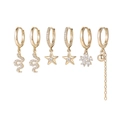 Detail view of a 6-piece gold hoop earring set with zircon-encrusted stars and snakes - Snake Star Hoop Earring Set