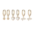 Detailed view of three pairs of gold-plated earrings with heart and lightning bolt charms - Round Bead Heart Earring Set