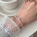 Zilveren kralenarmband met zeester en schelp hangers voor dames in elegante stijl - Zilveren Kraal Zeester Stijl