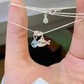 Collana argento con cuore, gemma a goccia blu e ciondolo a balena su catena - Stile Balena Cuore Goccia (EXTXL00062)