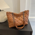 Elegant caramel quilted chain tote bag with silver hardware for casual commuting - Brown