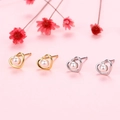 Detailed close-up of hollow heart-shaped earrings with central pearl on pink background - Heart Pearl Platinum