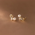 Elegant gold bow earrings with white pearls and sparkling cubic zirconia stones - Cross Zirconia Pearl-Gold