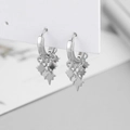 Elegant silver star drop earrings with three tiered charms on white card display - Silver Irregular Rhombus Hoop Earrings