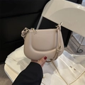 Beige semi-circular saddle bag with knot strap and gold accents in high quality faux leather - Khaki