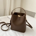 Elegant dark brown leather bucket bag with top handle and adjustable shoulder strap - Dark Brown