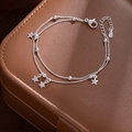 Detailed view of S925 sterling silver stamp on double-layer star bracelet with lobster clasp - Star Double Layer Style