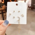 Macro shot of silver 925 star moon cloud stud earring set with long tassel details - Cloud Star Moon Tassel Earring Set