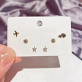 Detail of a 6-piece gold earring set featuring toy cars, planes and colorful bear motifs - Small Plane Car Stud Earring Set