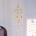 Macro detail of geometric suncatcher with crystal prisms creating rainbow light patterns - White