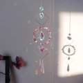 Dettaglio dell'acchiappasole con pietre viola e l'effetto di luce del prisma arcobaleno - Ametista (N0.1 紫水晶)