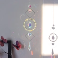 Detail of crystal suncatcher with natural stones casting rainbow light on a wall - No. 8 Prehnite / 50cm