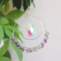Detailed view of bohemian suncatcher with moon pendant and colorful crystals on silver chain - Colorful Fluorite