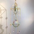 Detailed suncatcher view with golden geometric frame and natural raw crystals - Aventurine Jade