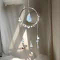 Detailed sun catcher with light blue opal and multifaceted crystal prism in natural light - Opal Style (RB3)