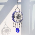 Detail of silver metal sun and moon wall hanging with blue evil eye glass charms - 40-45cm / Personified Sun Moon Style
