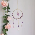 Detail of amethyst suncatcher with golden ring, raw crystal stone and hanging beads - Amethyst (RC5)